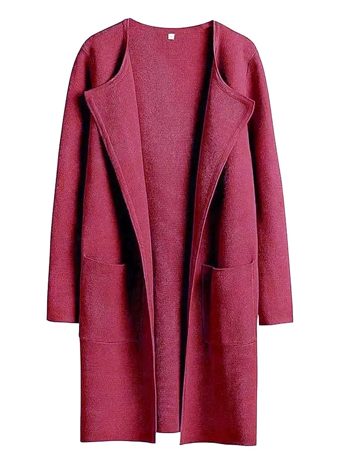 "Women's wool blend knee-length coat with wide lapel and patch pockets, showcasing a relaxed fit and minimalist design."