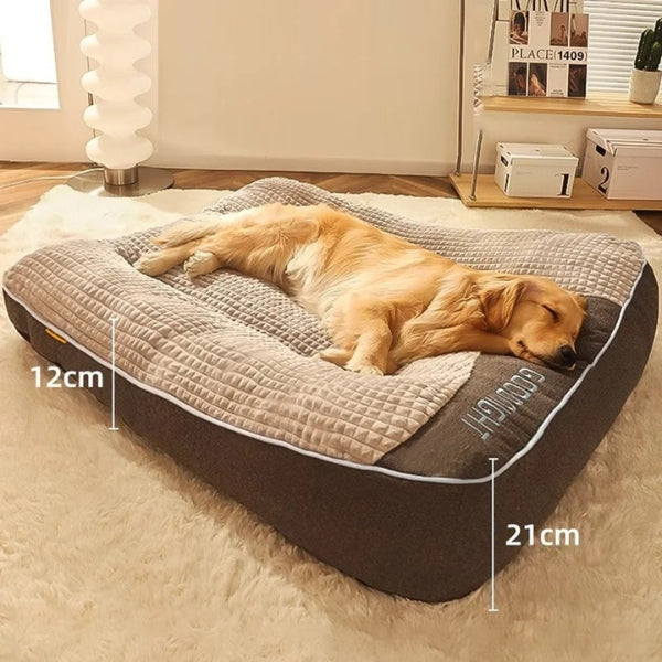 "XXL orthopedic dog bed with plush fabric and removable cover, ideal for large dogs, featuring anti-slip bottom and headrest.